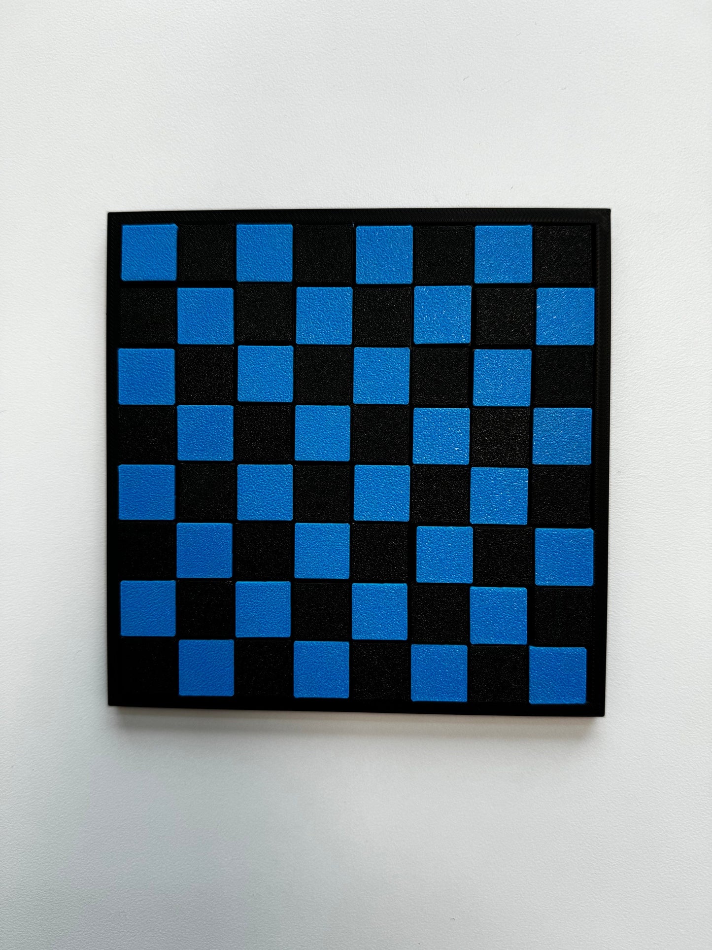 Checkerboard Dissection Puzzle by E. M. Wyatt